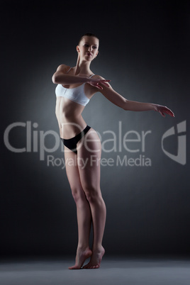 Sensual young model posing in dance pose