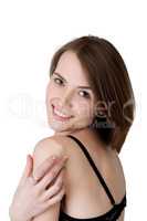Pretty woman with healthy skin smiling at camera