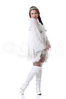 Pretty Russian girl posing in white folk dress