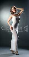 Sexy woman posing in erotic skin-tight negligee