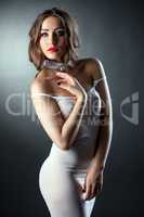 Portrait of sensual model in skin-tight negligee