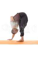 Side view of flexible man posing in yoga pose