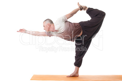 Image of man in sports wear practicing yoga