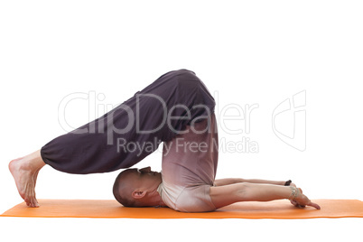 Side view of relaxed flexible yoga trainer