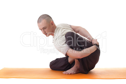 Shot of handsome middle aged yogi posing in studio