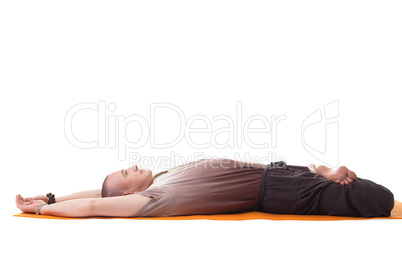 Smiling sporty man posing in relaxed yoga pose