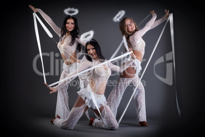 Image of sexy dancers in costumes with halos