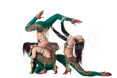 Young flexible belly dancers isolated on white