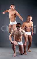 Image of attractive male models advertising briefs