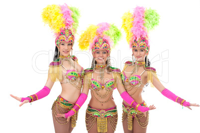 Cute girls posing in colorful carnival costumes