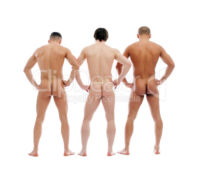 Three muscular naked men posing back to camera