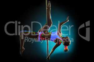 Graceful pole dancer with UV pattern on body