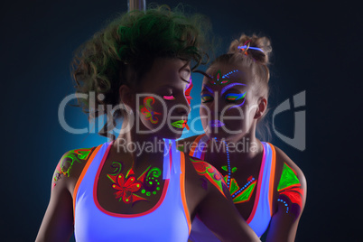Image of sensual dancers with fluorescent makeup