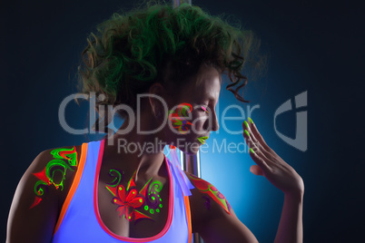 Portrait of artistic dancer with bright uv makeup