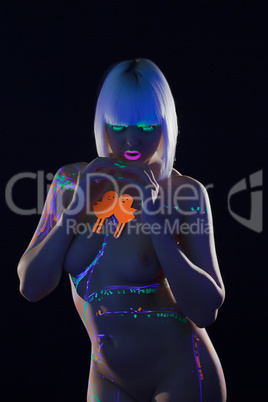 Naked woman with spectacular neon pattern on body