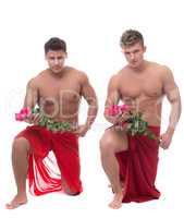 Sexy guys posing with roses, isolated on white
