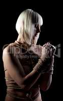 Portrait of beautiful nude blonde with hands bound