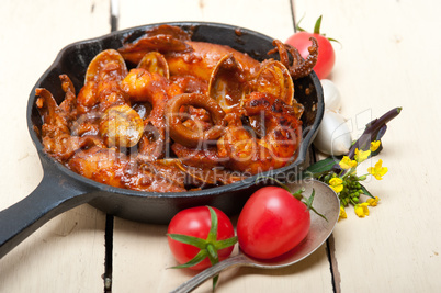 fresh seafoos stew on an iron skillet