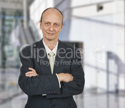 Businessman in suit with white shirt and tie