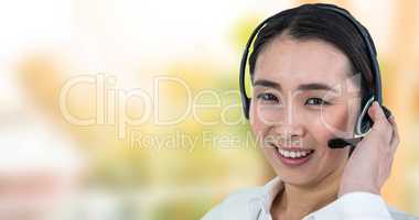 Smiling beautiful businesswoman using headset against ladder use