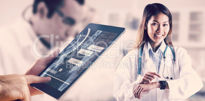 Composite image of asian doctor using her smart watch