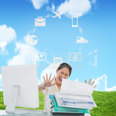 Composite image of businesswoman shouting with stack of folders