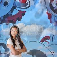 Composite image of casual businesswoman looking at camera with a