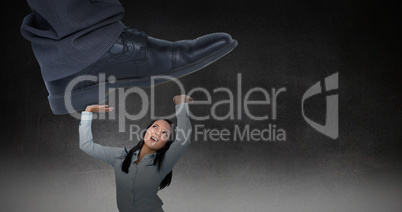 Composite image of businessman about to step on banana peel