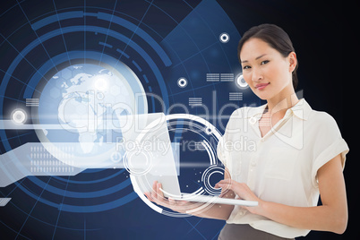 Composite image of asian businesswoman using laptop