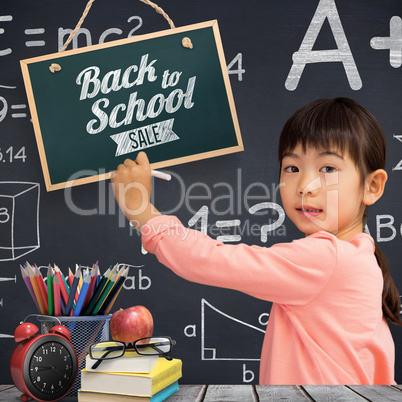 Composite image of pupil drawing with chalk