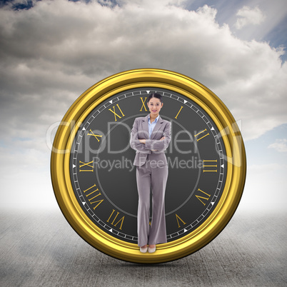 Composite image of portrait of a brunette businesswoman with the