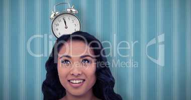 Composite image of smiling asian woman with paper crown