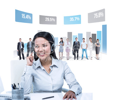 Composite image of smiling businesswoman using headset