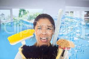 Composite image of very stressed woman with cleaning tools