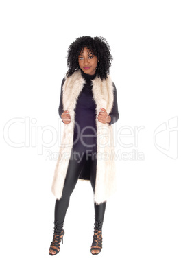 African American woman in fur coat.