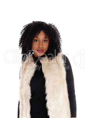 Closeup African American woman in fur coat.