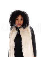 Closeup African American woman in fur coat.