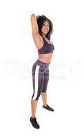 African American woman in exercising outfit.