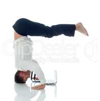 Concept of ??multitasking - businessman doing yoga