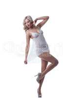 Young playful blonde advertises erotic negligee