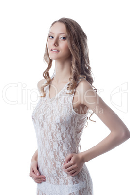Shot of charming long-haired girl in lace negligee