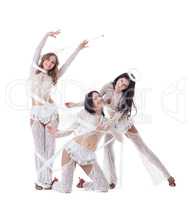 Trio of cute young girls posing dressed as angels