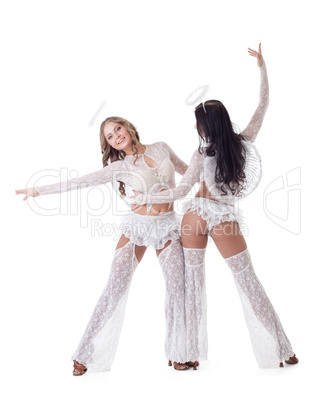 Cute dancers posing as angels, isolated on white