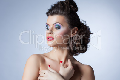 Seductive model posing with evening makeup