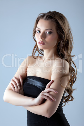 Snapshot of beautiful young model with curly hair