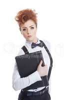 Charming red-haired businesswoman posing at camera