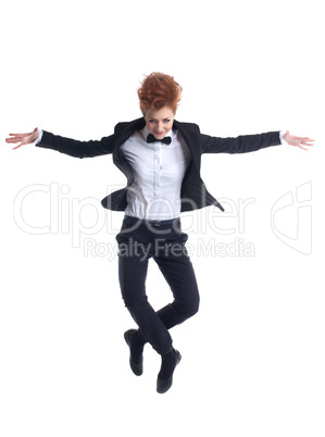 Smiling dancer jumping, isolated on white backdrop