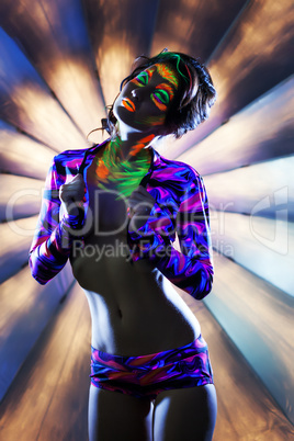 Image of emotional young girl posing in nightclub