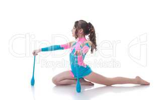 Curly girl doing gymnastic exercises with mace