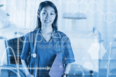 Composite image of asian nurse with stethoscope looking at the c